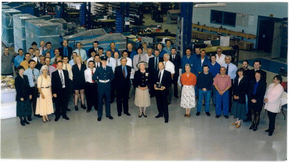 Inductotherm Heating and Welding team receiving the Queens award from the Queen Mother for Export Innovation in 1999
